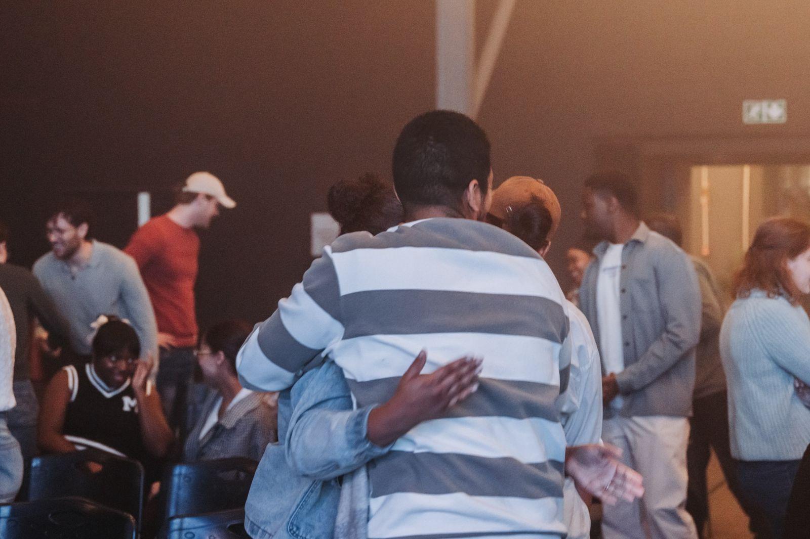 Friends embracing at a gathering