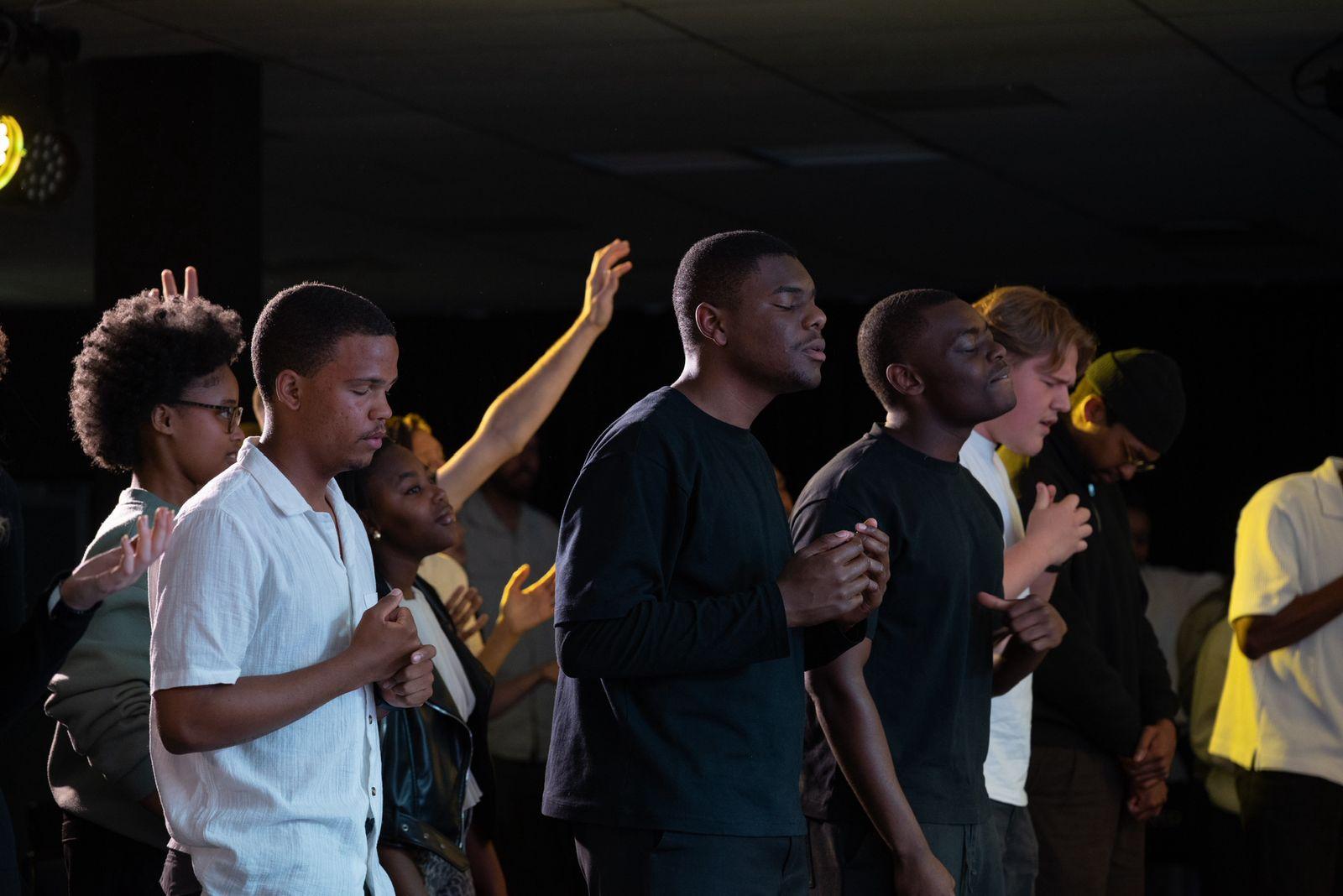 Someone being prayed for at a Helderberg Young Adults gathering
